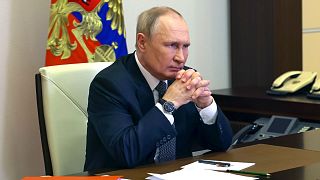 Russian President Vladimir Putin chairs a Security Council meeting via videoconference at the Novo-Ogaryovo residence outside Moscow, Russia