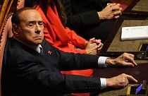 Silvio Berlusconi ocupando su asiento en el Senado italiano