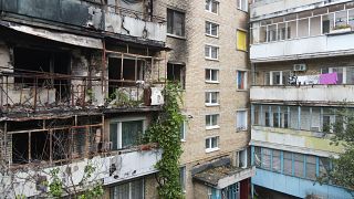 A building stands damaged by a missile in Irpin, near Kyiv, amid Russian aggression in Ukraine