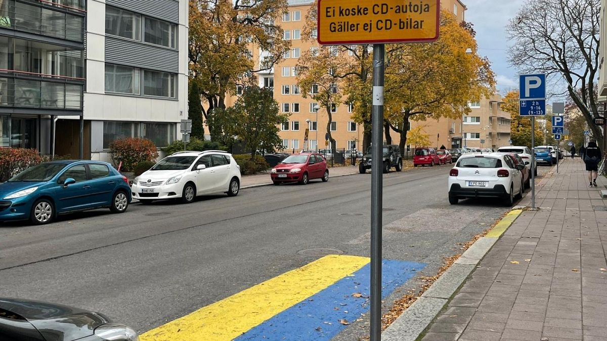 The colours of Ukraine's flag painted in the parking space outside home of Russian Consul General, Turku, Finland. October 2022