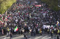 People attend a protest against the Iranian regime, in Berlin, 22 October 2022