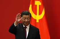 China's president Xi Jinping announces third term in power and new top team.