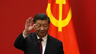 China's president Xi Jinping announces third term in power and new top team.