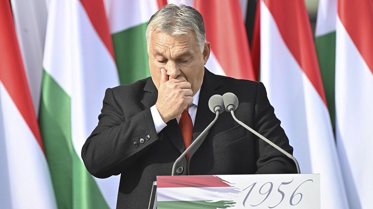 PM Viktor Orban reacts as he delivers a speech during an event to commemorate the 66th anniversary of the Hungarian uprising against the Soviet occupation, 23 October 2022