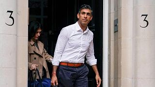 Conservative Party leadership candidate Rishi Sunak leaves his campaign office, in London, Sunday, Oct. 23, 2022.