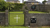 This June 4, 2014 file photo shows the site of a mass grave for children who died in the Tuam mother and baby home, in Tuam, County Galway, Ireland