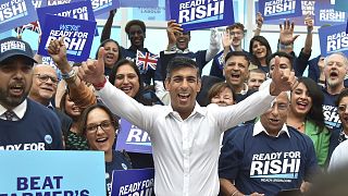 Rishi Sunak meets supporters as he arrives to attend a Conservative Party leadership election hustings in Birmingham, England. Tuesday, 23 August 2022.