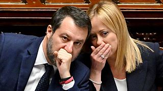 Italy’s new Prime Minister Giorgia Meloni talks with Deputy Prime Minister in Rome on October 25, 2022.
