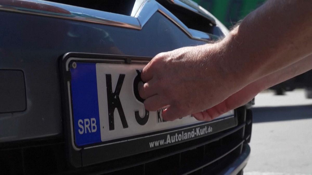 Serbian licence plate is covered at Kosovo border 