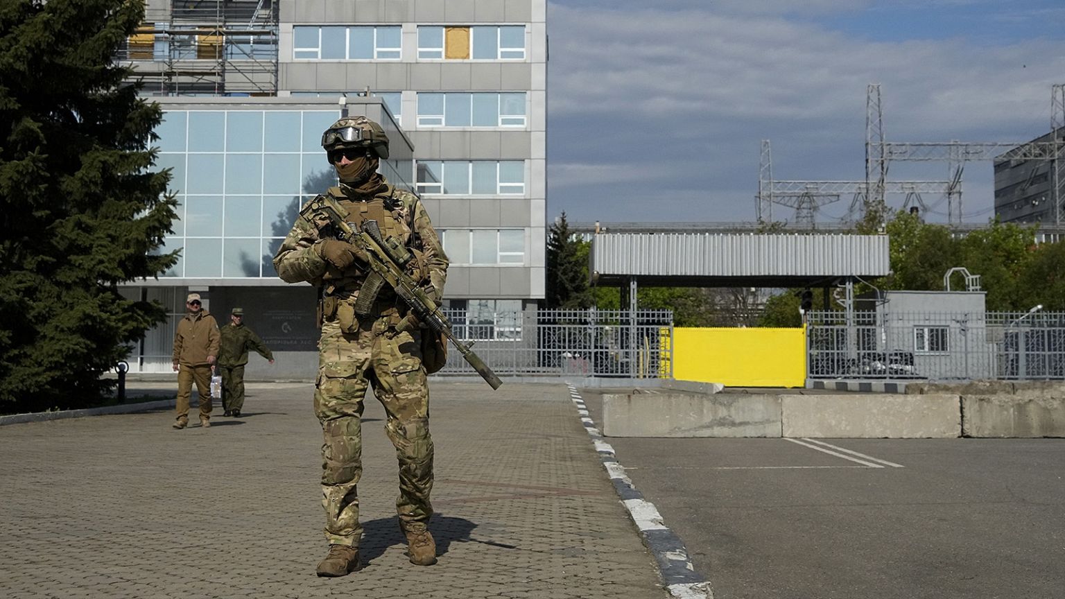 A Russian serviceman stands guard in an area of the Zaporizhzhia Nuclear Power Station, 1 May 2022