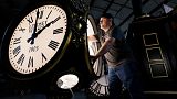 Dan LaMoore works on a Seth Thomas Post Clock at Electric Time Company