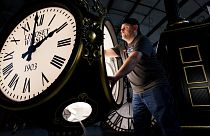 Dan LaMoore works on a Seth Thomas Post Clock at Electric Time Company, Friday, Oct. 23, 2020, in Medfield, Mass., US.