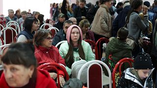 Evacuees from Kherson gather upon their arrival at the railway station in Anapa, southern Russia on October 25th.