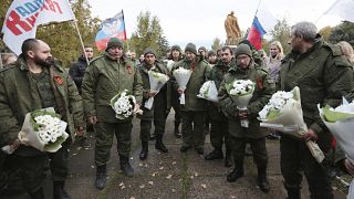 14 prisonniers libérés par l'Ukraine dans le cadre d'un échange de prisonniers, à Novoazovsk, 21 octobre 2022.