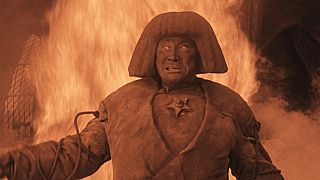 The Golem, a creature made of clay conjured up as a protector who turns against its creator - still from the film Der Golem (1920)