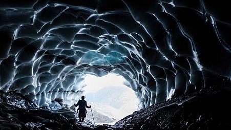A melting glacier revealed a cave in Vaettis, Switzerland this summer.