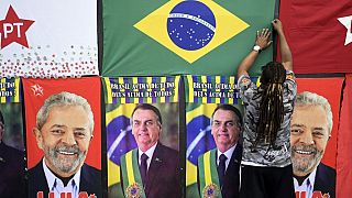 Towels with the images of Jair Bolsonaro and Lula da Silva are hanged for sale at a street stall in Belo Horizonte, Brazil, on 25 October, 2022.
