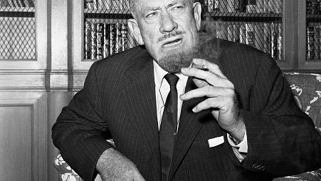 John Steinbeck talks to media in the office of his publisher in New York on Oct. 25, 1962