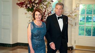FILE: House Minority Leader Nancy Pelosi of Calif., and her husband, Paul, arrive for a state dinner at the White House, Tuesday, April 28, 2015