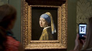 Johannes Vermeer's Girl with a Pearl Earring (approx. 1665) at the Mauritshuis in The Hague