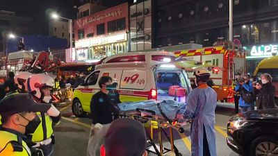 Emergency services arrive on site to aid victims of a South Korea Halloween crush turned deadly.