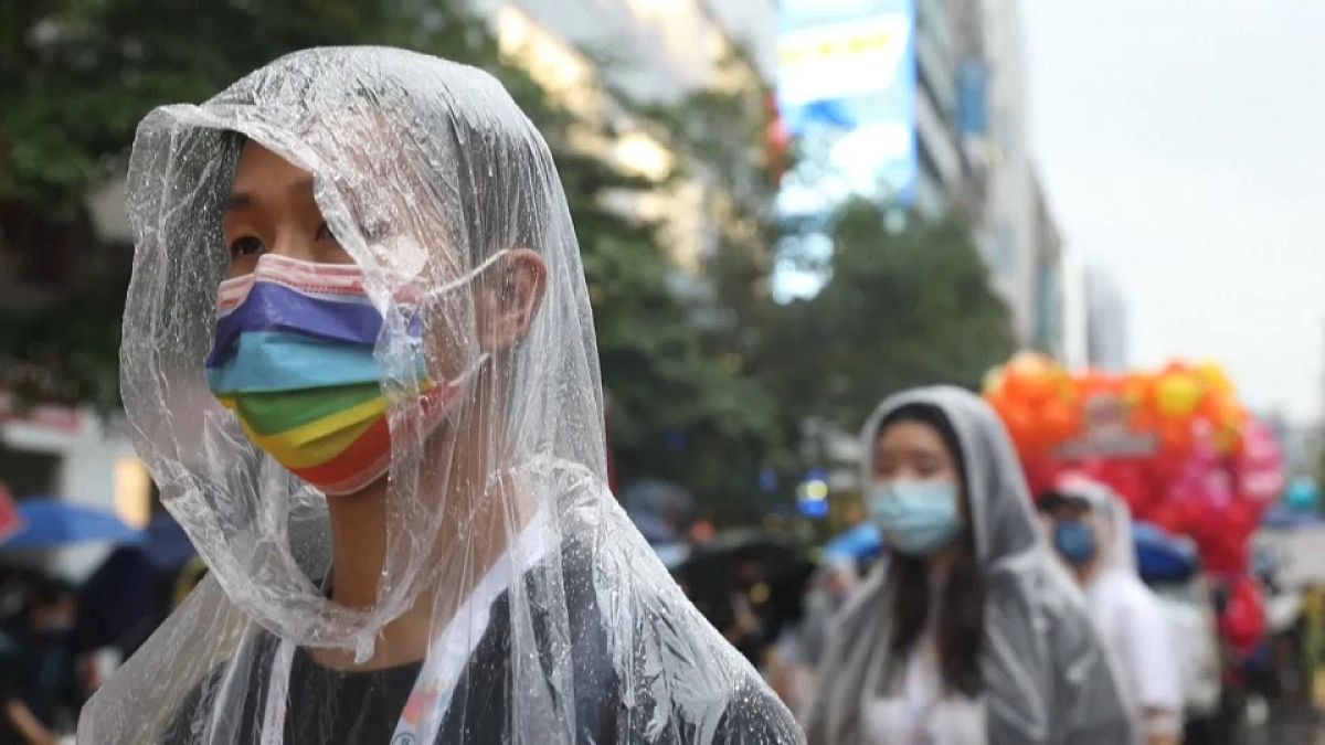 A participant wears  a pride mask at the LGBTQ parade in Taipei 