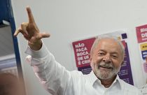 Luiz Inacio Lula da Silva smiles after voting in a run-off presidential election in Sao Paulo, Brazil, Sunday, Oct. 30, 2022.
