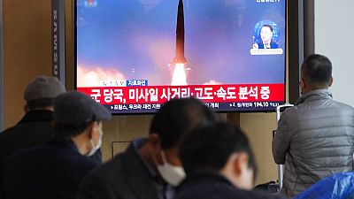 A TV screen shows a file image of North Korea's missile launch during a news program at the Seoul Railway Station in Seoul, South Korea