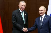 Recep Tayyp Erdogan e Vladimir Putin num encontro ocorrido a 13 de outubro