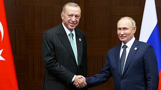 Recep Tayyp Erdogan e Vladimir Putin num encontro ocorrido a 13 de outubro