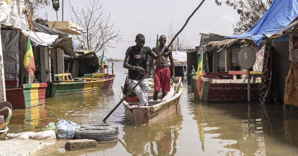 Floods strike a blow to tourism around Senegal's Pink Lake and salt industry