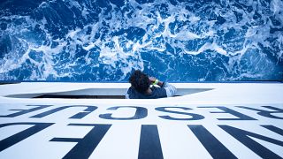 Uno dei naufraghi tratti in salvo nelle acque al largo delle coste siciliane dall'imbarcazione Humanity 1 dell'Ong tedesca SOS Humanity