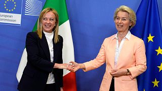 European Commission President Ursula von der Leyen, right, greets Italian Prime Minister Giorgia Meloni at EU headquarters in Brussels, Thursday, Nov. 3, 2022.