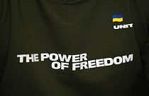 Detalhe da t-shirt envergada por Mikhailo Fedorov