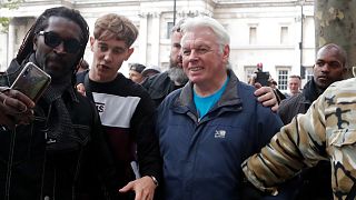 English conspiracy theorist David Icke leaving a 'We Do Not Consent' rally at Trafalgar Square, organised by Stop New Normal, to protest against coronavirus restrictions.