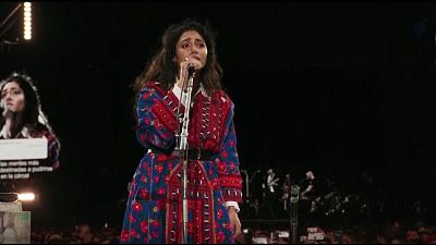 Iranian actress Golshifteh Farahani sings "Baraye" with music band Coldplay in Buenos Aires, Argentina.