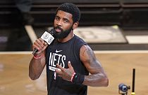 Brooklyn Nets guard Kyrie Irving speaks before an NBA game in New York