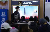 A TV screen shows a file image of North Korea's missile launch during a news program at the Seoul Railway Station in Seoul, South Korea.