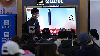 A TV screen shows a file image of North Korea's missile launch during a news program at the Seoul Railway Station in Seoul, South Korea. 