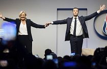 French far right leader Marine Le Pen celebrates with newly elected leader of the National Rally president Jordan Bardella during the party congress in Paris, 5 November 2022