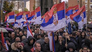 Kosovo Serbs wave Serbian flags during a protest in the Serb-majority municipality of North Mitrovica, 6 November 2022
