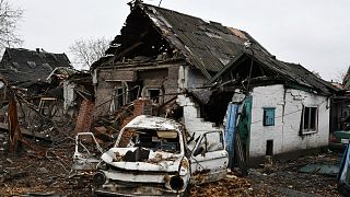 A damaged Soviet-era Ukrainian car "Zaporozhets" is seen next to a destroyed apartment building after Russian shelling in Pokrovsk, Donetsk region, Ukraine, 4 November 2022