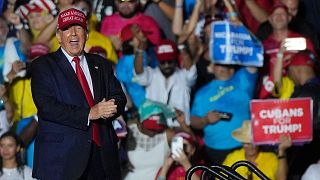 Former President Donald Trump reacts to the crowd after he finished speaking at a rally for Marco Rubio, Sunday, Nov. 6, 2022, in Miami.