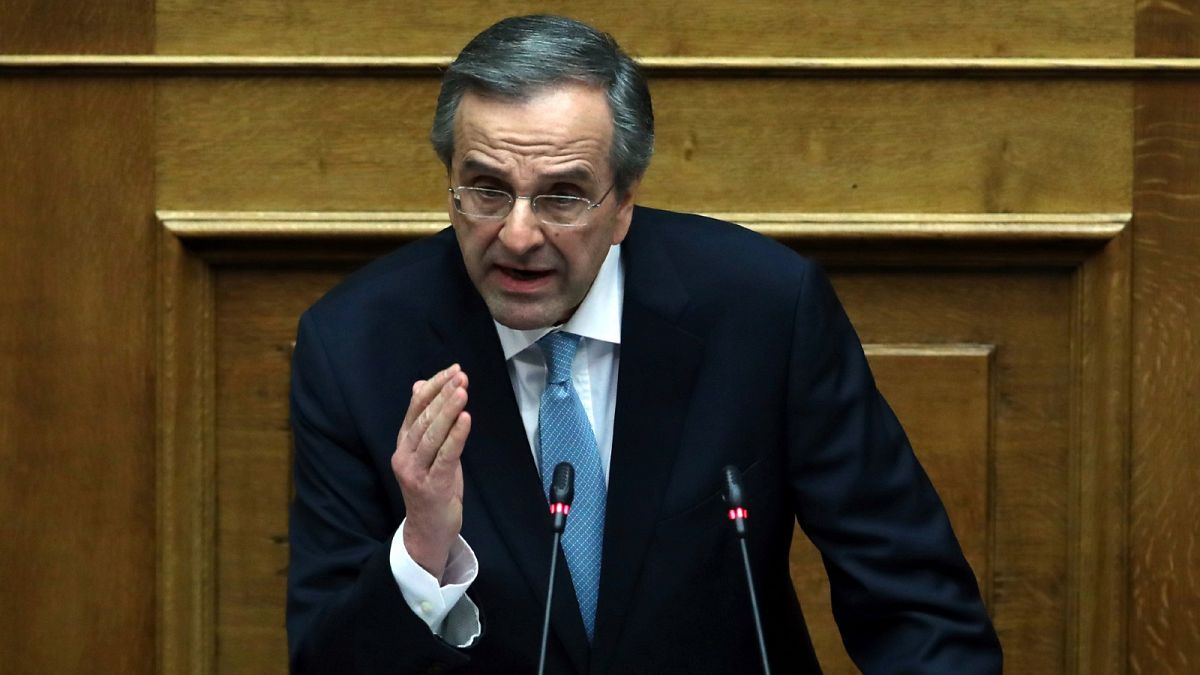 Former Greek Prime Minister Antonis Samaras delivers a speech during a parliament session in Athens, Feb. 21, 2018.