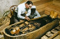 Howard Carter examine King Tut's sarcophagus, colourisation by Dynamichrome