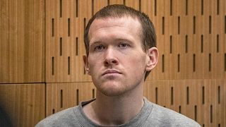 FILE - Australian Brenton Harrison Tarrant, 29, sits in the dock at the Christchurch High Court, New Zealand, Aug. 27, 2020.
