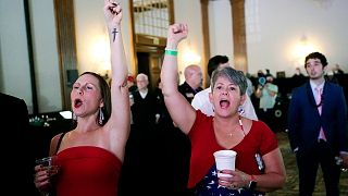 Republican candidate supporters cheer on the latest voting results for Kari Lake, at the Republican watch party in Scottsdale, Ariz., Tuesday, Nov. 8, 2022. 