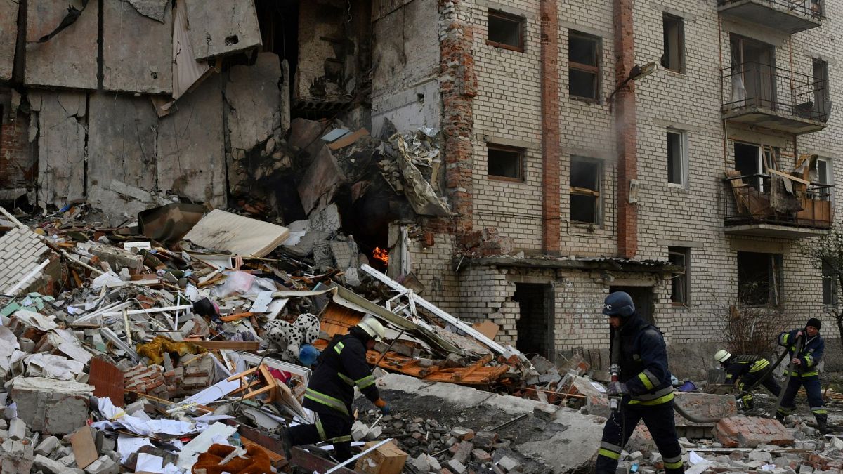 Firefighters work at the scene of a damaged residential building after Russian shelling in the liberated Lyman, Donetsk region, Ukraine, Monday, Nov. 7, 2022. 