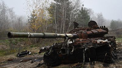 A destroyed Russian tank is seen near the recently recaptured village of Yampil, Ukraine, Wednesday, Nov. 9, 2022.