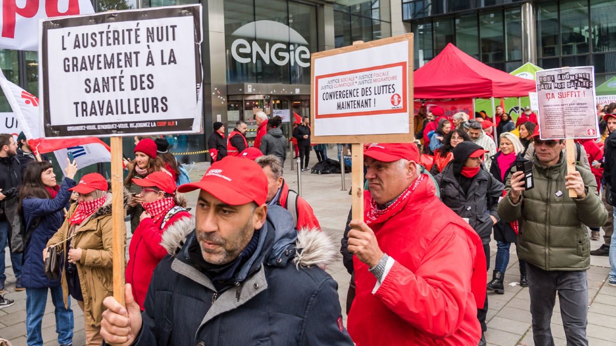 Trade union members demonstrate in front of Engie headquarters in Brussels, Nov. 9, 2022.